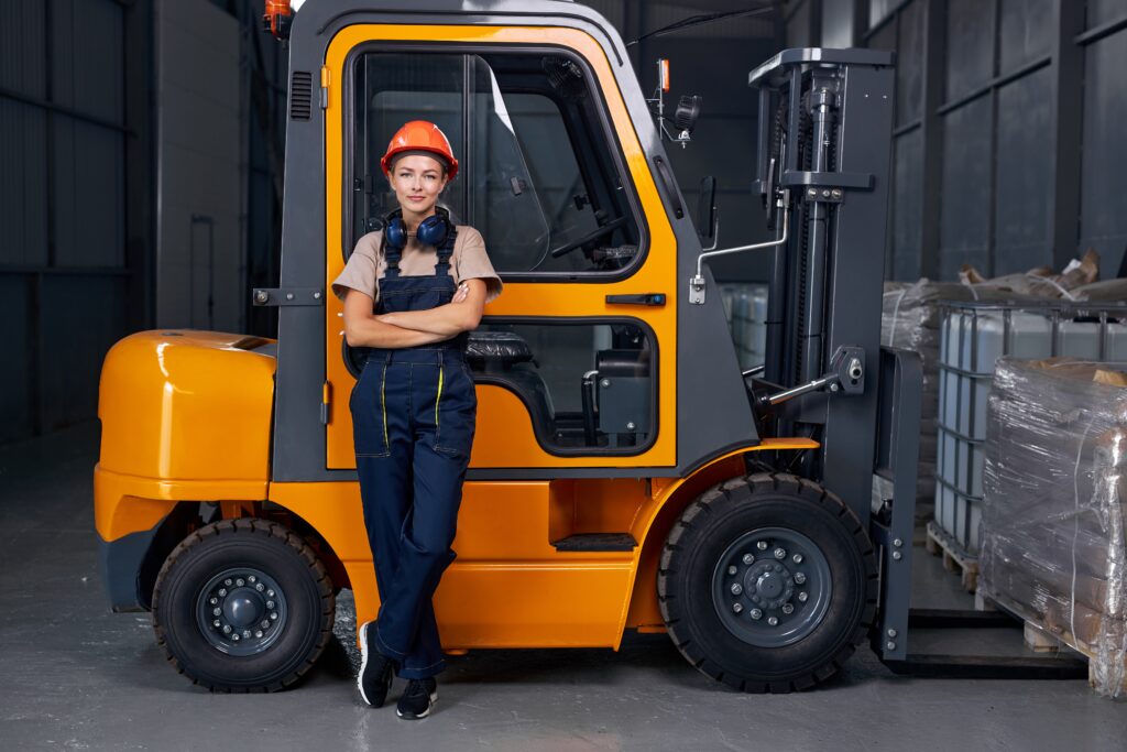 Smiling Lady taking Forklift training