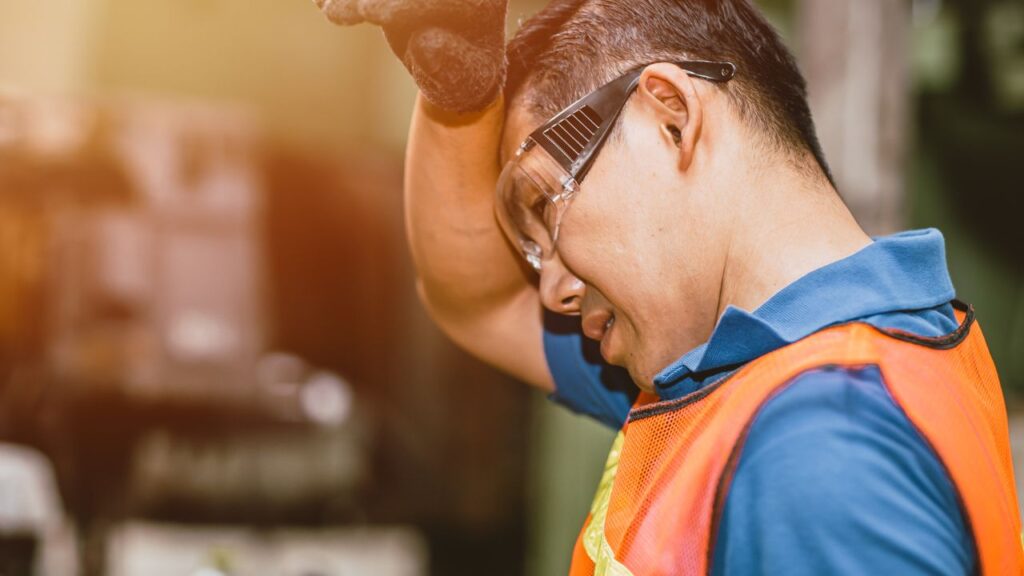 Image of a man under heat stress in workplace